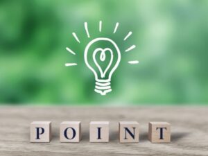 緑背景にPOINTブロックと電球